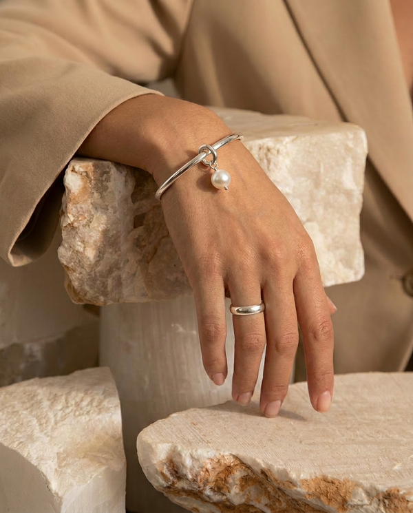 /products/pulsera-perla-silver